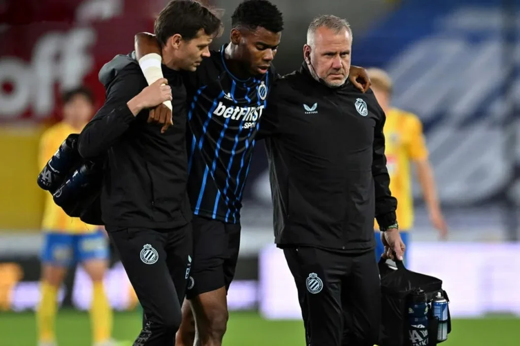Raphael Onyedika leaves pitch injured