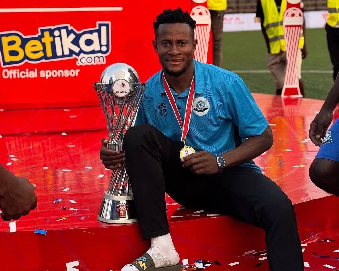Super Eagles goalkeeper Amas Obasogie celebrates winning CECAFA Kagame Cup win