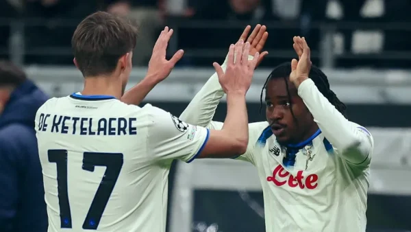 Lookman celebrating with teammate