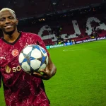 Victor Osimhen celebrating Champions League hat-trick